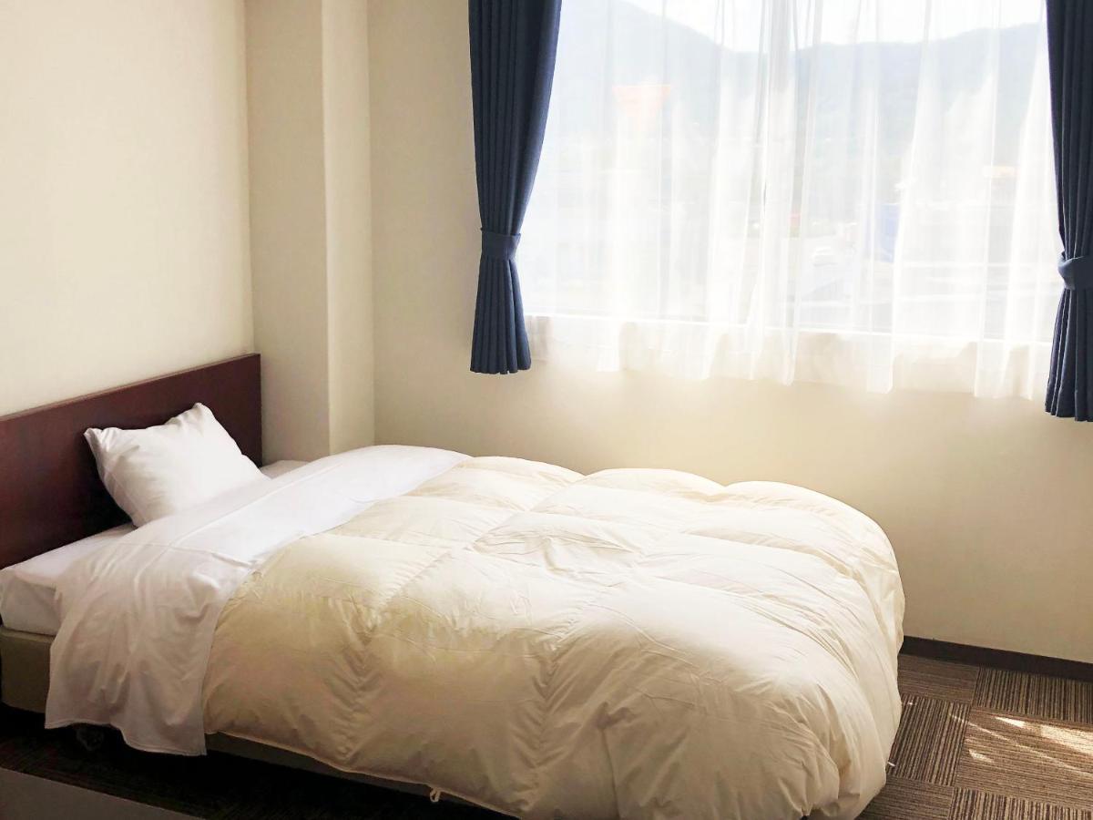 Business Hotel Fujimi Фудзиёсида Экстерьер фото