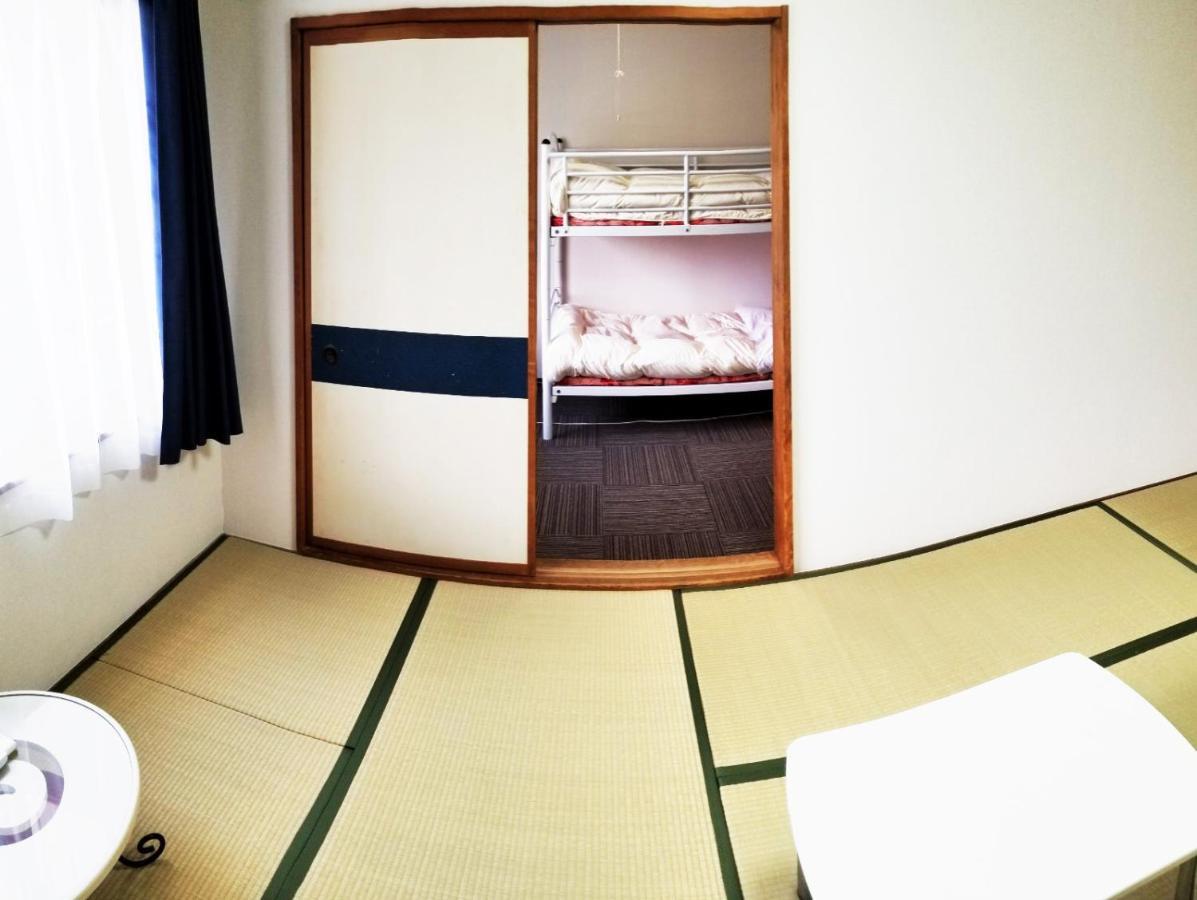 Business Hotel Fujimi Фудзиёсида Экстерьер фото
